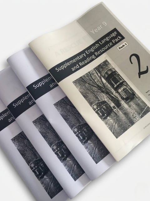Stack of Year 9 Supplementary English Language and Reading Resource Pack books with black and white spines fanned out